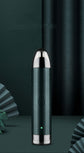 Portable Razor Nose Hair Trimmer Armpit Hair in dark green color with LED display and rotary heads design.